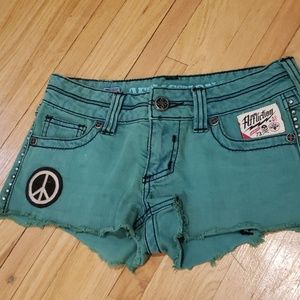 Green with patches affliction shorts